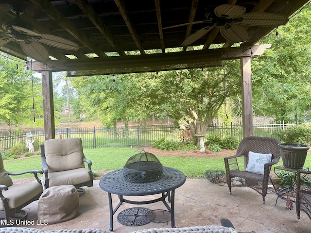 771 Versailles Dr, Ridgeland, MS 39157 - view of patio with ceiling fan and a fire pit