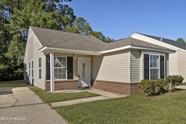 view of front of home with a front yard