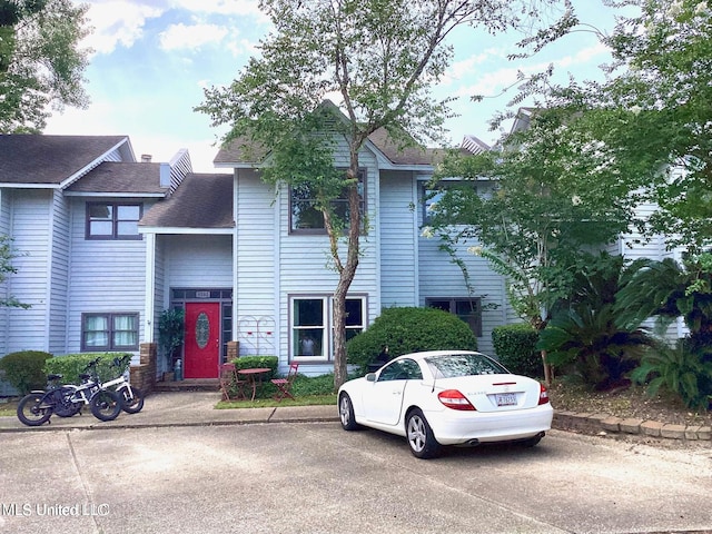 8102 Fairway Villa Dr, Gautier, MS 39553 - view of property featuring a shingled roof