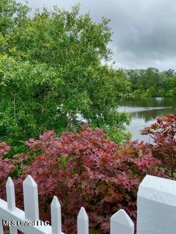 8102 Fairway Villa Dr, Gautier, MS 39553 - view of yard with a water view