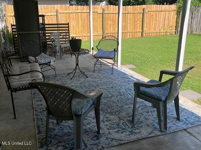 view of patio / terrace with fence