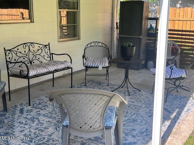 view of patio / terrace with fence