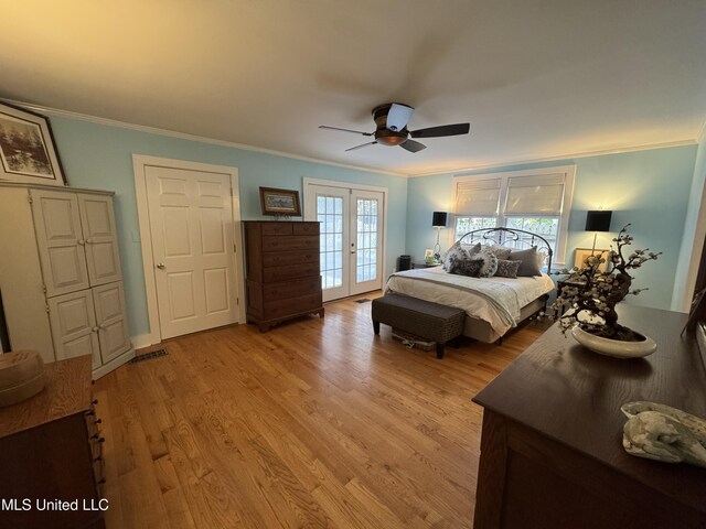 bedroom with crown molding, access to exterior, and french doors