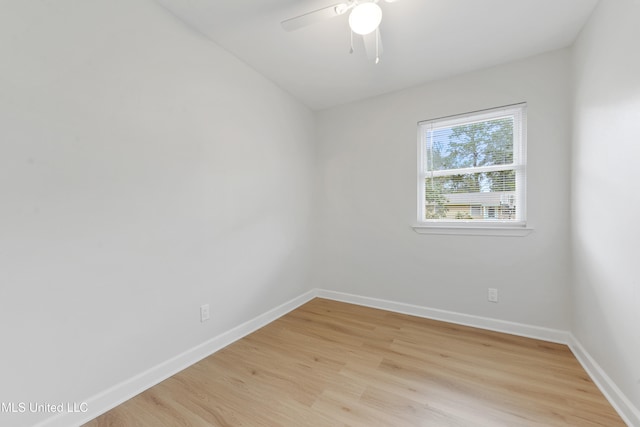 empty room with light wood-type flooring and ceiling fan