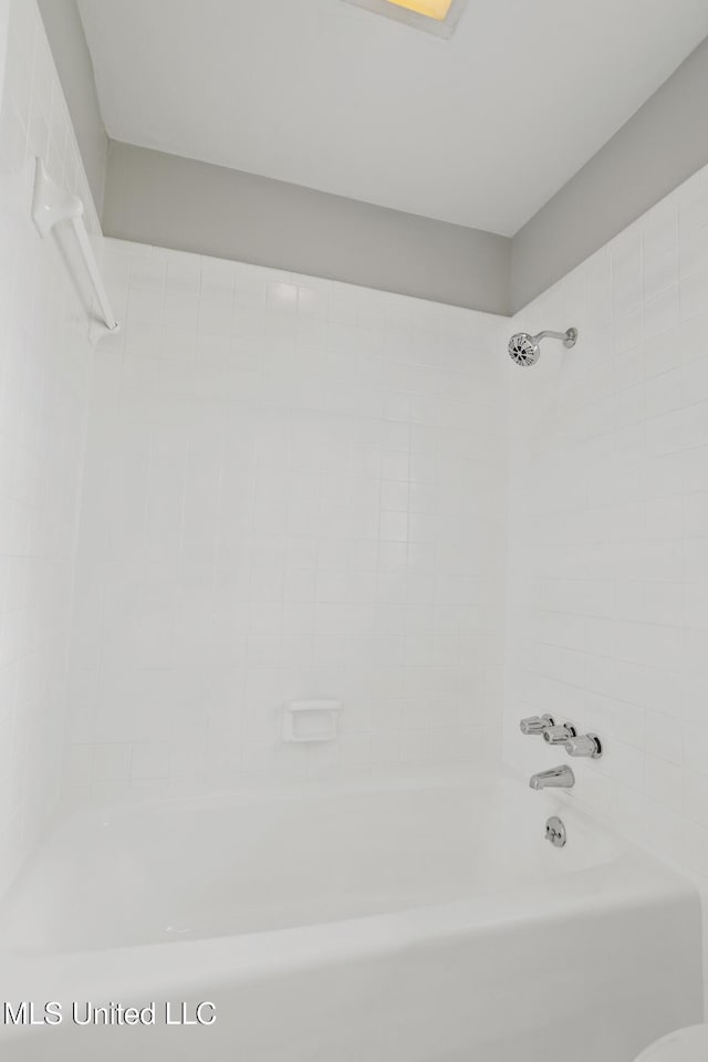 bathroom with shower / bathing tub combination