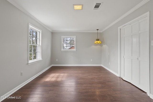 unfurnished bedroom with dark wood-type flooring, baseboards, visible vents, and ornamental molding