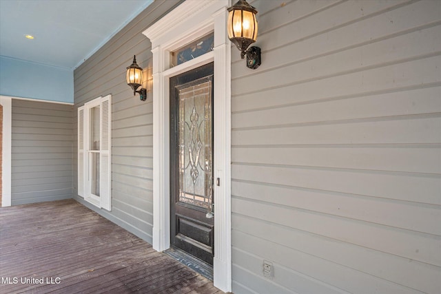 entrance to property with covered porch