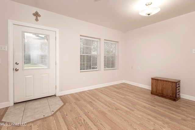 entrance foyer with light hardwood / wood-style flooring