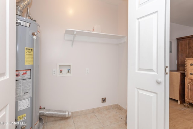 laundry area featuring electric dryer hookup, washer hookup, light tile patterned flooring, and water heater