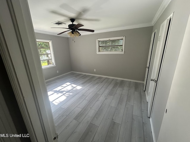 600 Jackson Ave, Mccomb, MS 39648 - empty room featuring wood finished floors, ornamental molding, and ceiling fan
