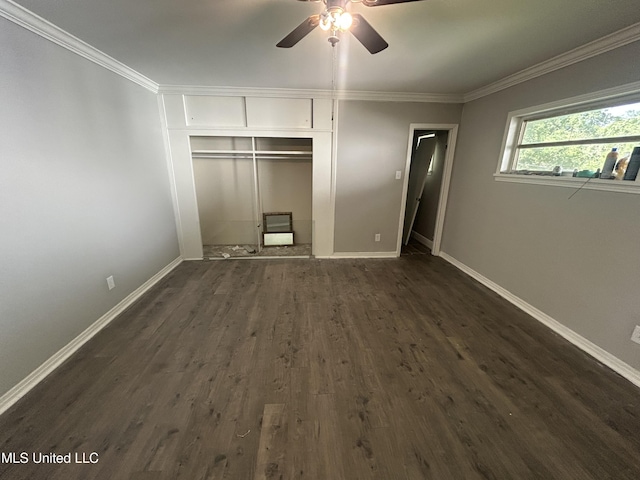 600 Jackson Ave, Mccomb, MS 39648 - unfurnished bedroom with dark wood-style floors, crown molding, a closet, and a ceiling fan