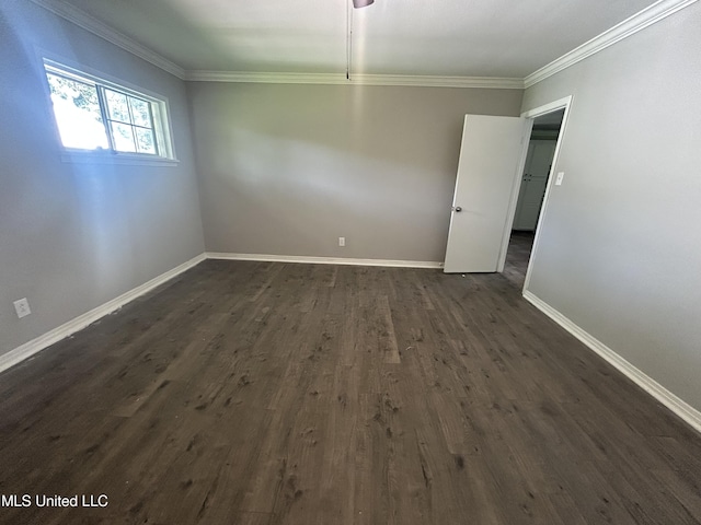 600 Jackson Ave, Mccomb, MS 39648 - unfurnished room with crown molding and dark wood finished floors