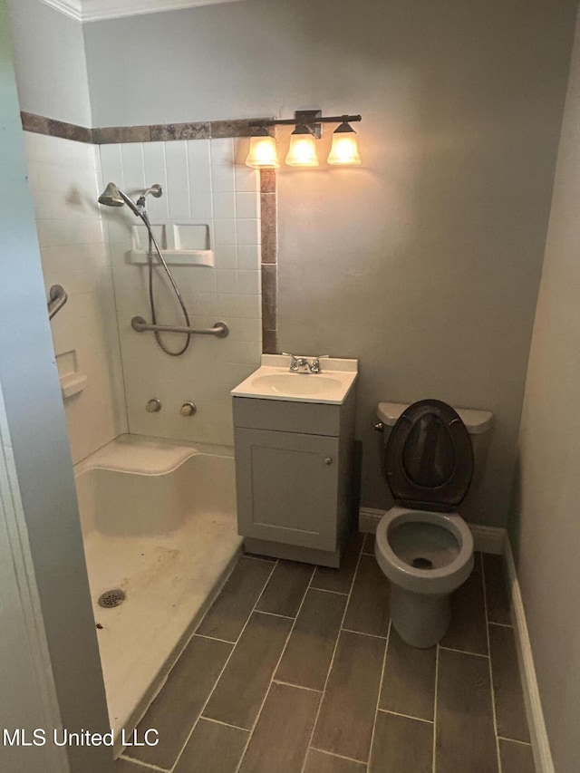 600 Jackson Ave, Mccomb, MS 39648 - bathroom with a stall shower and vanity
