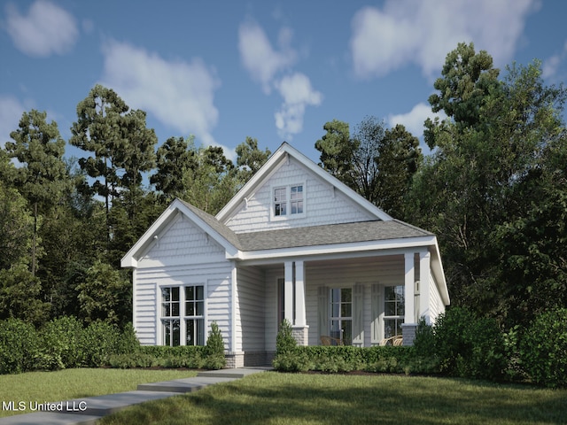 view of front facade featuring a porch, a front yard, and a shingled roof
