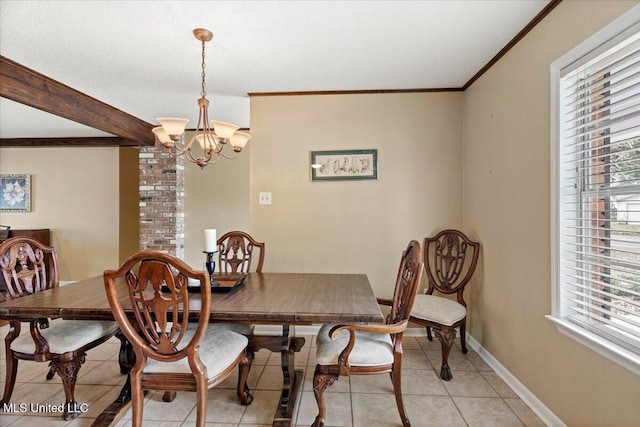 dining room featuring a wealth of natural light, baseboards, an inviting chandelier, and light tile patterned floors