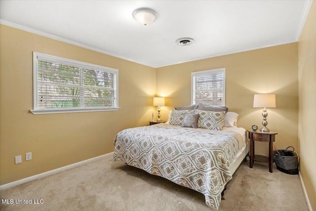 bedroom featuring baseboards, visible vents, crown molding, and light colored carpet