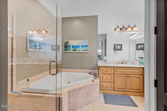 bathroom with tile patterned flooring, vanity, and separate shower and tub