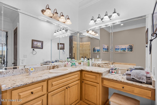 bathroom with a shower with door, vanity, and crown molding