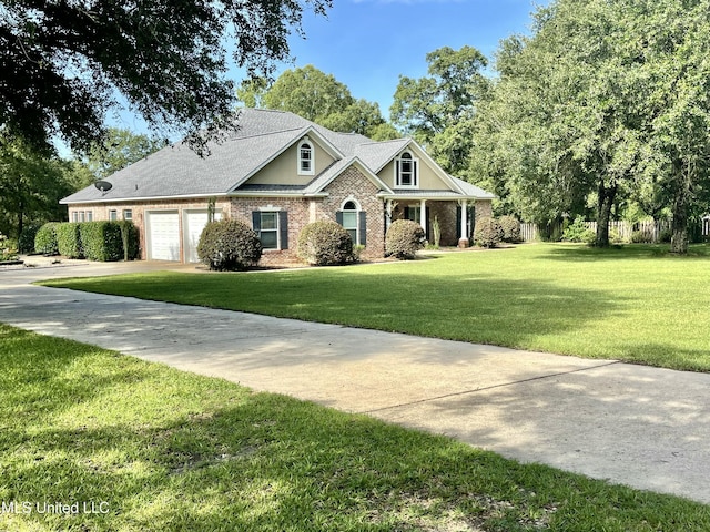24000 Robert E Lee Rd, Lucedale, MS 39452 - craftsman inspired home with a garage, brick siding, and concrete driveway