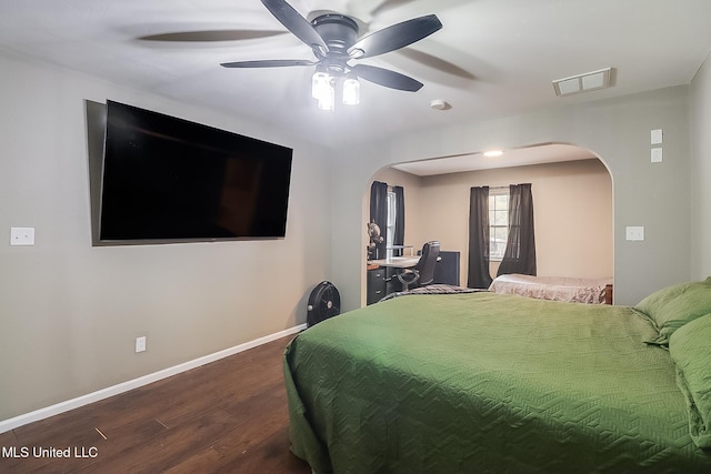 bedroom featuring dark hardwood / wood-style floors and ceiling fan