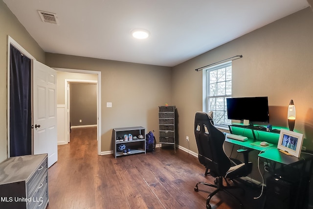 home office featuring dark wood-type flooring