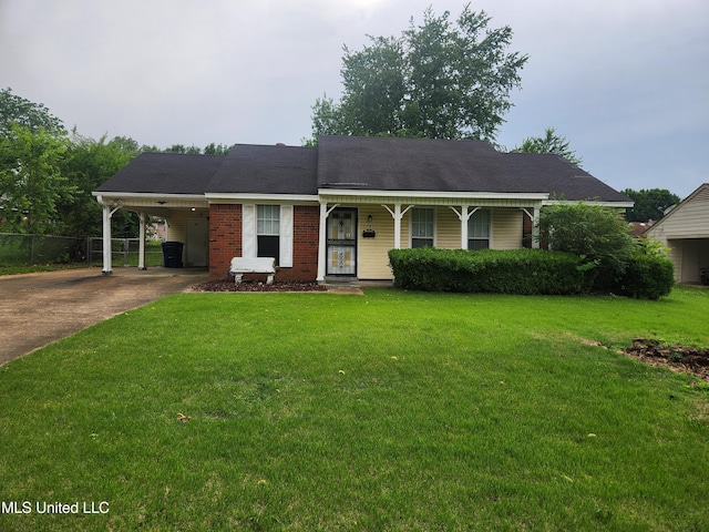 6285 Collinwood Rd, Horn Lake, MS 38637 - view of front of property featuring concrete driveway, an attached carport, and covered porch