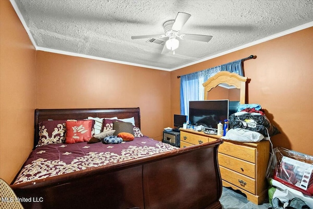 bedroom featuring ceiling fan, a textured ceiling, and ornamental molding