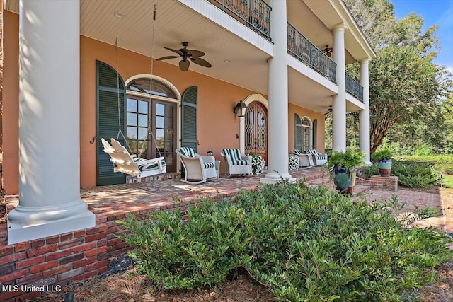 607 Tiffintown Rd, Vicksburg, MS 39183 - view of patio with a ceiling fan and a balcony