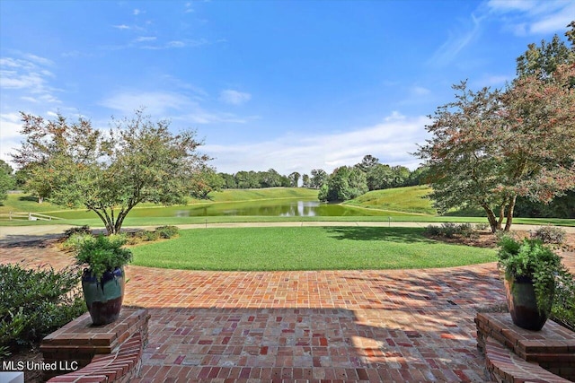 607 Tiffintown Rd, Vicksburg, MS 39183 - surrounding community with a patio area, a water view, and a yard
