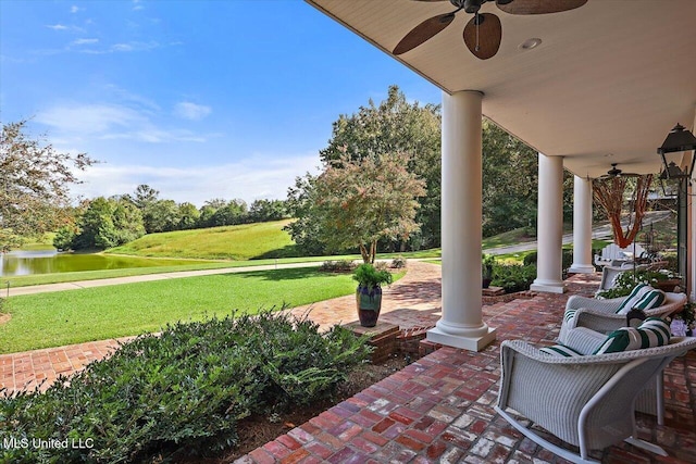 607 Tiffintown Rd, Vicksburg, MS 39183 - view of patio / terrace with a water view and ceiling fan