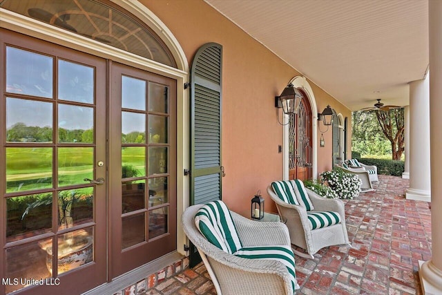 607 Tiffintown Rd, Vicksburg, MS 39183 - view of patio with french doors, a porch, and a ceiling fan