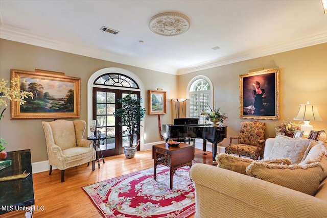 607 Tiffintown Rd, Vicksburg, MS 39183 - interior space featuring wood finished floors, visible vents, a wealth of natural light, and crown molding