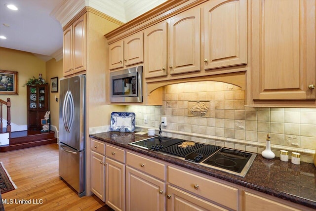 607 Tiffintown Rd, Vicksburg, MS 39183 - kitchen featuring recessed lighting, stainless steel appliances, dark stone countertops, light wood-style flooring, and tasteful backsplash