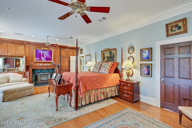 607 Tiffintown Rd, Vicksburg, MS 39183 - bedroom with baseboards, light wood finished floors, and visible vents