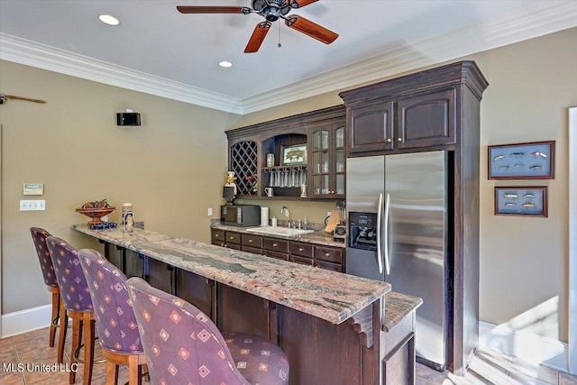 607 Tiffintown Rd, Vicksburg, MS 39183 - bar with stainless steel fridge with ice dispenser, wet bar, a ceiling fan, ornamental molding, and a sink
