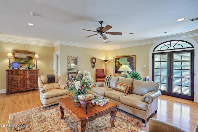 607 Tiffintown Rd, Vicksburg, MS 39183 - living area featuring crown molding, a ceiling fan, light wood-style floors, and visible vents