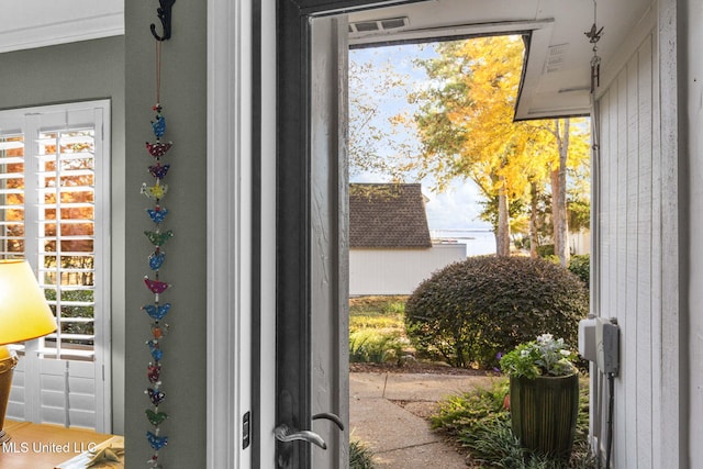 doorway to outside featuring a wealth of natural light