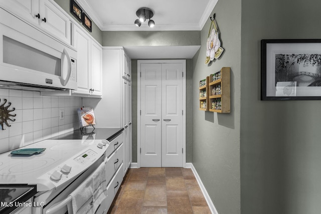 kitchen with decorative backsplash, white cabinetry, crown molding, and white appliances