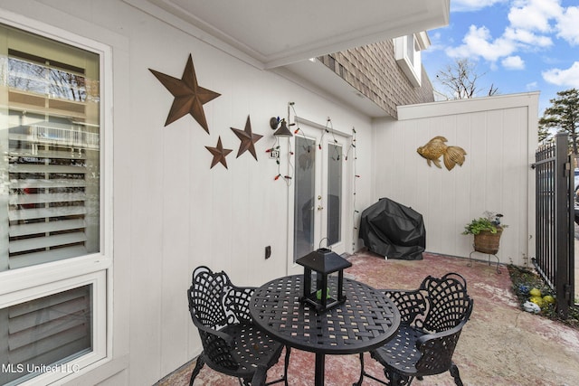 view of patio featuring grilling area and french doors