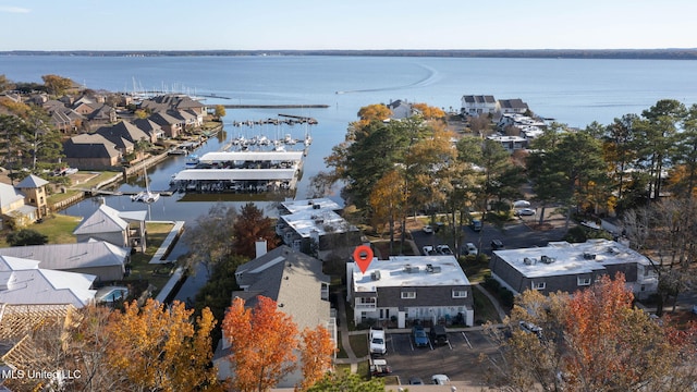 drone / aerial view with a water view