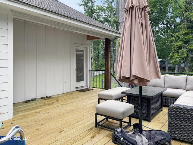 wooden deck with an outdoor hangout area