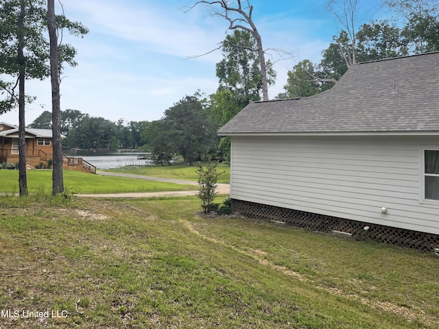 view of yard with a water view