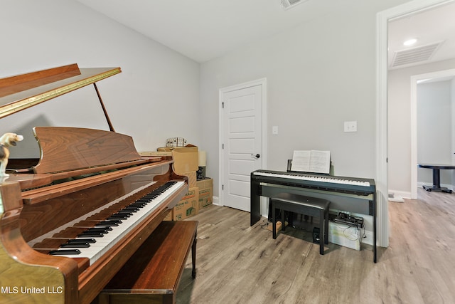 miscellaneous room with light wood-type flooring