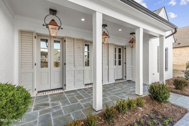 entrance to property with covered porch