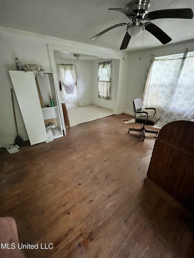 bedroom with wood finished floors and ceiling fan