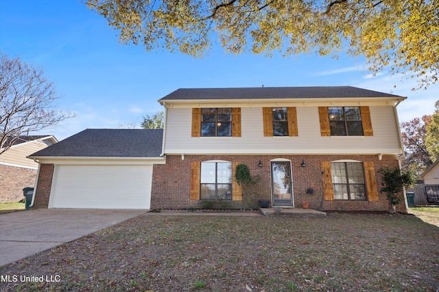 view of front of home with a garage and a front lawn