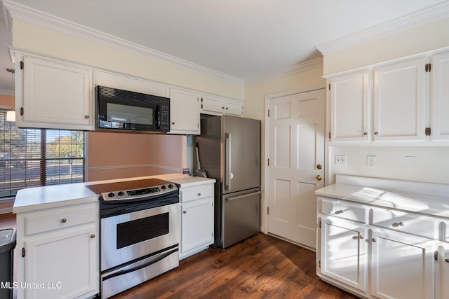 kitchen with crown molding, white cabinetry, dark hardwood / wood-style flooring, and stainless steel appliances