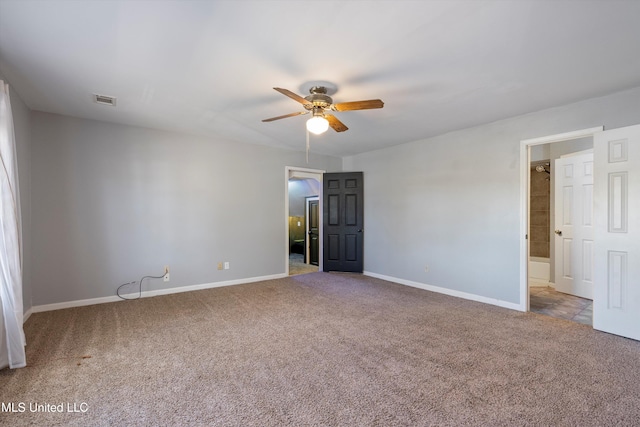 unfurnished room featuring ceiling fan and light carpet