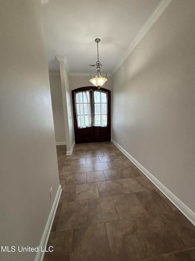 8 Jennie Ln, Picayune, MS 39466 - doorway featuring crown molding, french doors, and baseboards