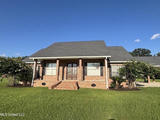 8 Jennie Ln, Picayune, MS 39466 - view of front of property with a front lawn, brick siding, and a shingled roof